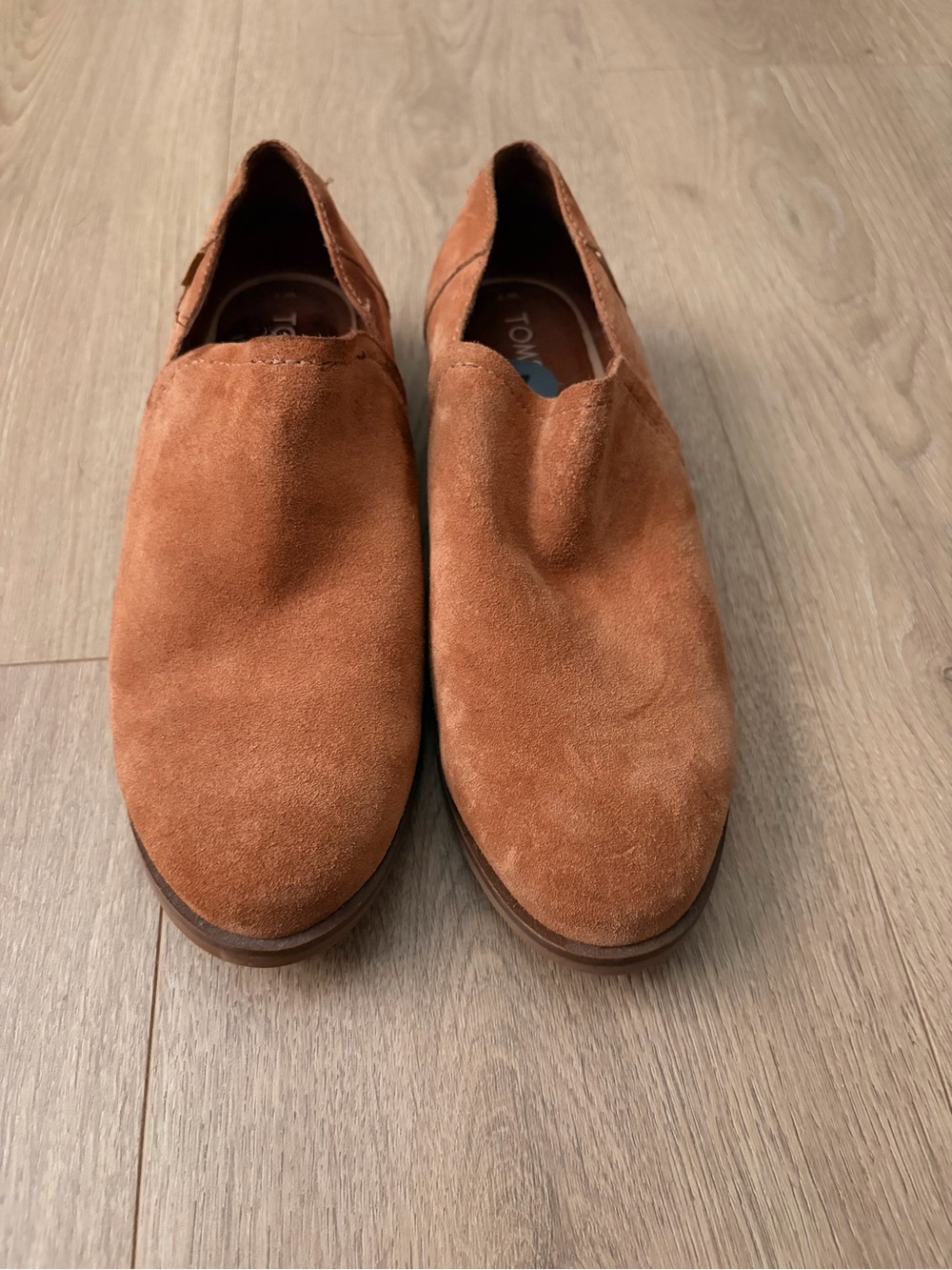 Brown suede TOMS loafers